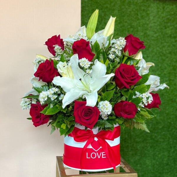 Bucket de rosas y lirios